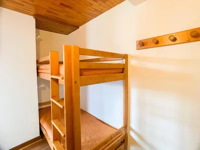 Un ou plusieurs lits dans un hébergement de l'établissement Studio confortable à Tignes avec balcon et animaux admis - FR-1-502-498