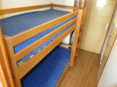 Un ou plusieurs lits dans un hébergement de l'établissement Studio proche pistes, balcon, animaux acceptés - FR-1-502-500