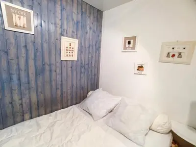 Un ou plusieurs lits dans un hébergement de l'établissement Studio lumineux à Tignes Val Claret, proche pistes et commerces, balcon, animaux permis - FR-1-502-499