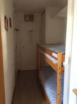 Un ou plusieurs lits dans un hébergement de l'établissement RESIDENCE LE BORSAT SUR PISTE STUDIO CABINE BALCON 64 chemin du Borsat TIGNES VAL CLARET