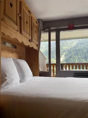 Un ou plusieurs lits dans un hébergement de l'établissement Superbe studio au pied des oeufs