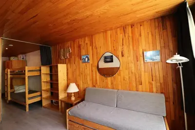 Coin salon dans l'établissement Résidence Hauts Du Val Claret B2 - Studio confortable · Entre pistes et commerces MAE-3644
