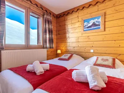 Un ou plusieurs lits dans un hébergement de l'établissement Apartment Ecrin des Neiges - Val Claret-4 by Interhome