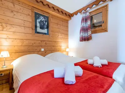 Un ou plusieurs lits dans un hébergement de l'établissement Apartment Ecrin des Neiges - Val Claret-4 by Interhome