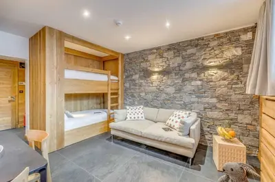 Un ou plusieurs lits dans un hébergement de l'établissement Cosy apartment 2 - 6 persons