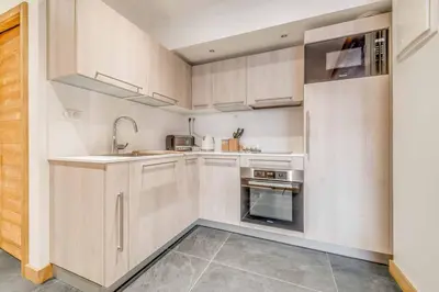 Cuisine ou kitchenette dans l'établissement Cosy apartment 2 - 6 persons