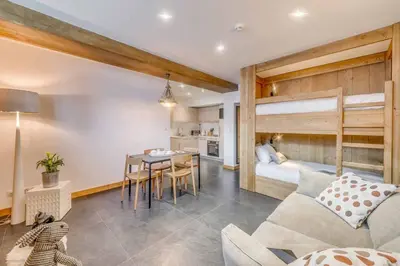 Coin salon dans l'établissement Cosy apartment 2 - 6 persons
