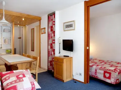 Un ou plusieurs lits dans un hébergement de l'établissement Confortable 2 Pièces à Tignes avec Animal admis - FR-1-502-511