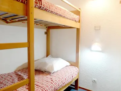Un ou plusieurs lits dans un hébergement de l'établissement Confortable 2 Pièces à Tignes avec Animal admis - FR-1-502-511