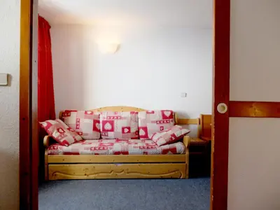 Un ou plusieurs lits dans un hébergement de l'établissement Confortable 2 Pièces à Tignes avec Animal admis - FR-1-502-511