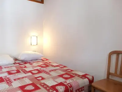 Un ou plusieurs lits dans un hébergement de l'établissement Confortable 2 Pièces à Tignes avec Animal admis - FR-1-502-511