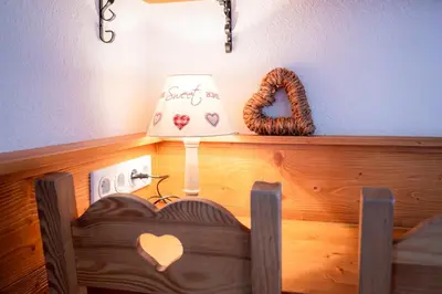 Un ou plusieurs lits dans un hébergement de l'établissement Le Cocon Detached chalet (6p). 3 bedrooms and 2 bathrooms