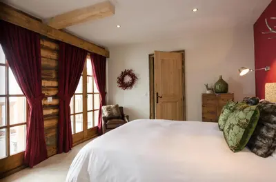 Un ou plusieurs lits dans un hébergement de l'établissement Black Diamond Sainte Foy Chalets