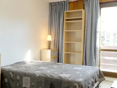 Un ou plusieurs lits dans un hébergement de l'établissement Appartement rénové au pied des pistes avec balcon à Tignes - FR-1-502-512