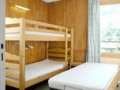 Un ou plusieurs lits dans un hébergement de l'établissement Appartement rénové au pied des pistes avec balcon à Tignes - FR-1-502-512