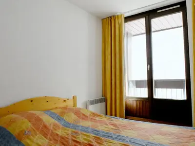 Un ou plusieurs lits dans un hébergement de l'établissement Résidence Tommeuses - Appartement fonctionnel·Pieds des pistes ·Balcon MAE-3654