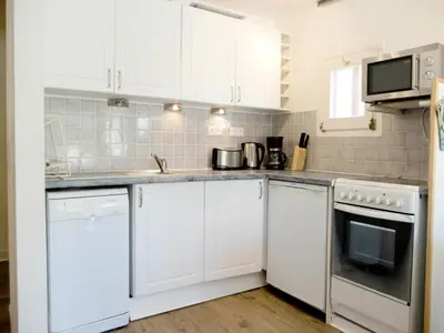 Cuisine ou kitchenette dans l'établissement Résidence Tour Du Lac - Appartement rénové·Proche des pistes ·Balcon MAE-1744