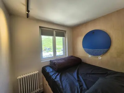 Un ou plusieurs lits dans un hébergement de l'établissement Résidence Rond Point Des Pistes B - Duplex de 45m² au Val Claret MAE-4624