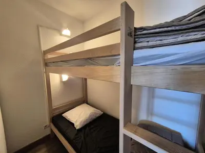 Un ou plusieurs lits dans un hébergement de l'établissement Résidence Plein Soleil - Appartement skis aux pieds · Proche du funiculaire MAE-4594