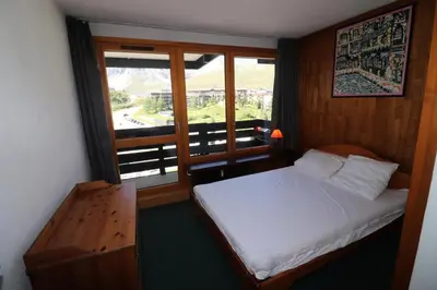 Un ou plusieurs lits dans un hébergement de l'établissement Résidence Tour Du Lac - Appartement fonctionnel·Proche des pistes MAE-8104