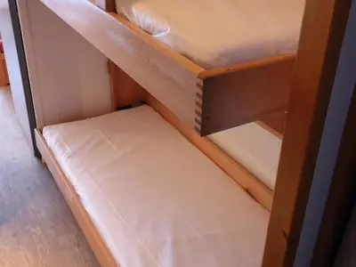 Un ou plusieurs lits dans un hébergement de l'établissement Studio confortable proche des pistes avec balcon, animaux acceptés - Tignes - FR-1-502-514