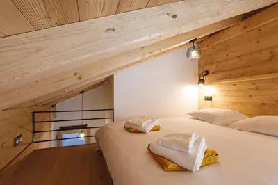 Un ou plusieurs lits dans un hébergement de l'établissement Chalet Bio Corti Spa 4 personnes