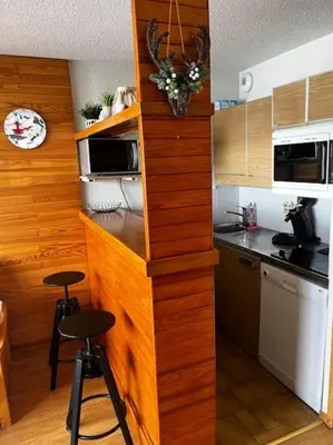 Cuisine ou kitchenette dans l'établissement Appartement BELLE PLAGNE et PARKING, ménage inclus