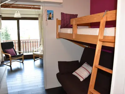 Un ou plusieurs lits superposés dans un hébergement de l'établissement Studio plein sud 4 pers, proche centre, terrasse - FR-1-464-216