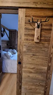 Un ou plusieurs lits dans un hébergement de l'établissement Arcs 1950 Appartement Luxe type chalet 5 à 7 personnes Vue imprenable sur le Montblanc skis aux pieds