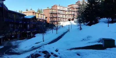 L'établissement Résidence Aiguille Grive Bat Iii - Appartement 3 pièces 6 personnes en duplex, skis aux pieds, dans le village de Charmettoger à Arc 1800 MAE-6944 en hiver