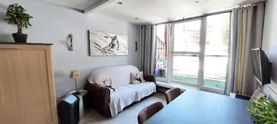 Télévision ou salle de divertissement dans l'établissement Résidence Aiguille Grive Bat Iii - Appartement 3 pièces 6 personnes en duplex, skis aux pieds, dans le village de Charmettoger à Arc 1800 MAE-6944