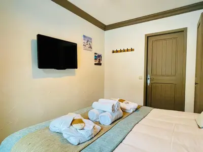 Un ou plusieurs lits dans un hébergement de l'établissement ARC 1950 Appt 6/8 pers LUXE MANOIR SAVOIE - SKI IN SKI OUT