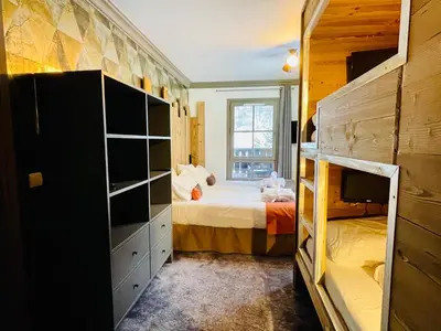 Un ou plusieurs lits dans un hébergement de l'établissement ARC 1950 Appt 6/8 pers LUXE MANOIR SAVOIE - SKI IN SKI OUT