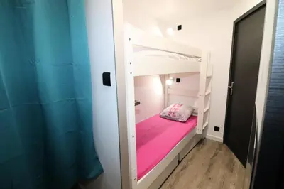 Un ou plusieurs lits dans un hébergement de l'établissement Résidence Home Club - Studio confortable · Skis aux pieds · Balcon MAE-0264