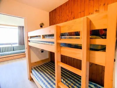 Un ou plusieurs lits superposés dans un hébergement de l'établissement Résidence Home Club - Studio lumineux · proche pistes et commerces MAE-0274