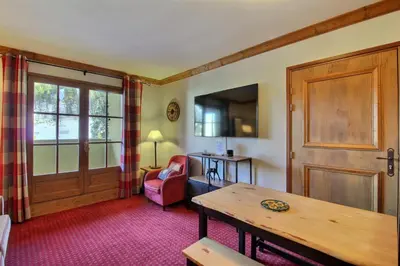 Coin salon dans l'établissement ARC 1950 - Appartement cosy et chaleureux - Sauna, Hammam, Jacuzzi, Piscine