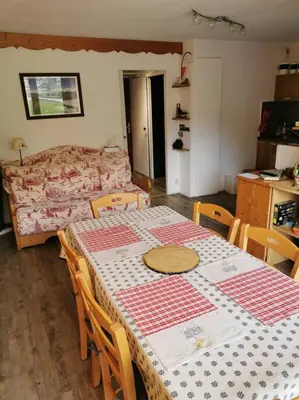 Coin salon dans l'établissement Appartement Termignon Val Cenis