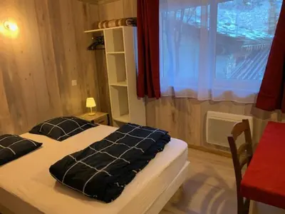 Un ou plusieurs lits dans un hébergement de l'établissement Le p'tit coin montagne 3