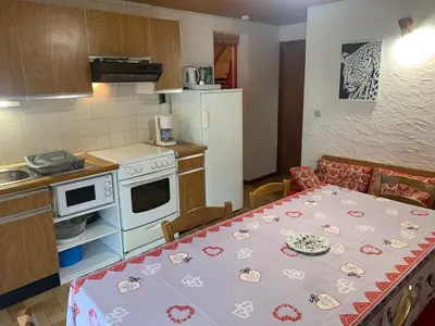 Cuisine ou kitchenette dans l'établissement Le p'tit coin montagne 3