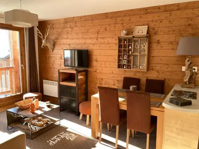 Cuisine ou kitchenette dans l'établissement Bel appartement avec balcon et parking couvert - FR-1-464-217