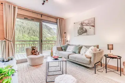 Coin salon dans l'établissement Résidence Les Terrasses De La Vanoise - 4 Pièces pour 8 Personnes MAE-7204