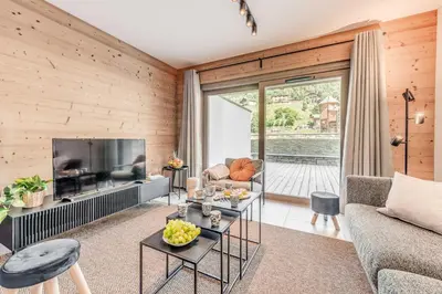 Coin salon dans l'établissement Résidence Les Terrasses De La Vanoise - 3 Pièces pour 6 Personnes MAE-7214