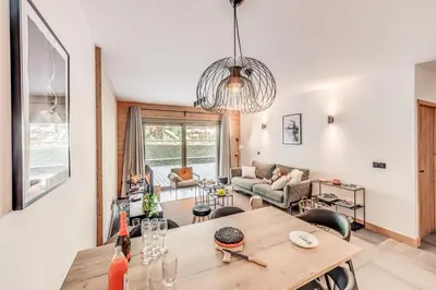 Coin salon dans l'établissement Résidence Les Terrasses De La Vanoise - 3 Pièces pour 6 Personnes MAE-7214