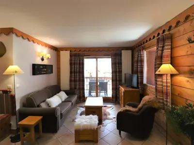Coin salon dans l'établissement Appartement spacieux à Tignes avec WIFI, terrasse pour 6 pers. - FR-1-502-527