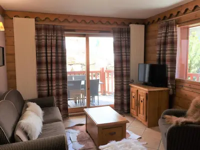 Télévision ou salle de divertissement dans l'établissement Appartement spacieux à Tignes avec WIFI, terrasse pour 6 pers. - FR-1-502-527