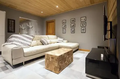 Coin salon dans l'établissement HaKaJu Appartement 10 personnes à Val Cenis