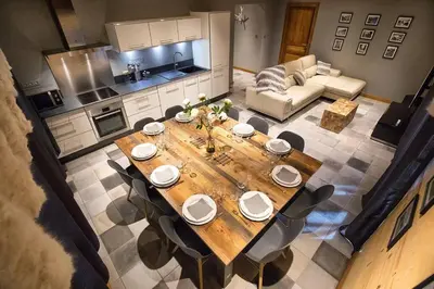 Coin salon dans l'établissement HaKaJu Appartement 10 personnes à Val Cenis