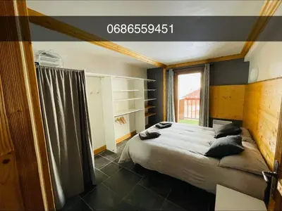 Un ou plusieurs lits dans un hébergement de l'établissement Beaver Creek appartement 12 Personnes à Val Cenis
