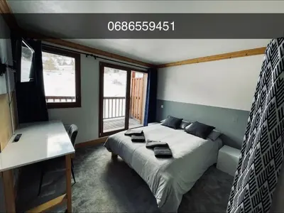 Un ou plusieurs lits dans un hébergement de l'établissement Beaver Creek appartement 12 Personnes à Val Cenis