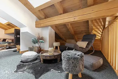Coin salon dans l'établissement Le Marteen’s appartement pour 6 personnes à Val Cenis